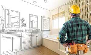 contractor looking at a bathroom remodel project