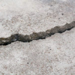 crack in the foundation indicating that a foundation repair is required