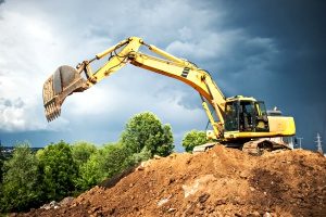 excavator doing earth moving at an Annapolis, MD fill dirt construction site for a new project
