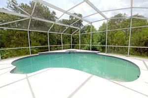 an above ground pool that was transformed to look exactly like an inground pool thanks to good quality Maryland free dirt