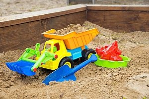 excess sand from a construction project used to make the sandbox that is displayed in the picture while the rest was hauled through a dirt removal contractor in Fairfax, VA