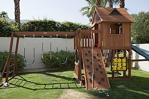 a playset that was recenty built by a homeowner in his backyard with fill dirt as the base