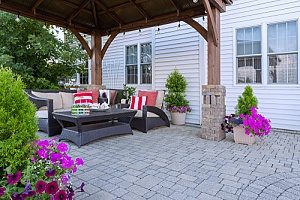 a paver patio that features a gazebo in the backyard of a Fairfax, VA home after the homeowners decided to receive pool removal services from a trusted and reputable pool removal contractor