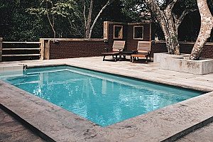 a backyard pool that will receive summer pool removal