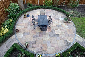 a circular stone island built with the help of a fill dirt base