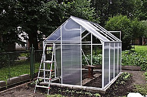 backyard greenhouse under construction