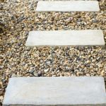 pea gravel patio ground with stepping stones