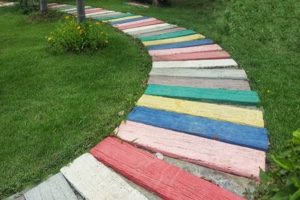multicolored walking path in a backyard