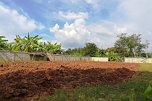 a construction site with many cubic feet of dirt