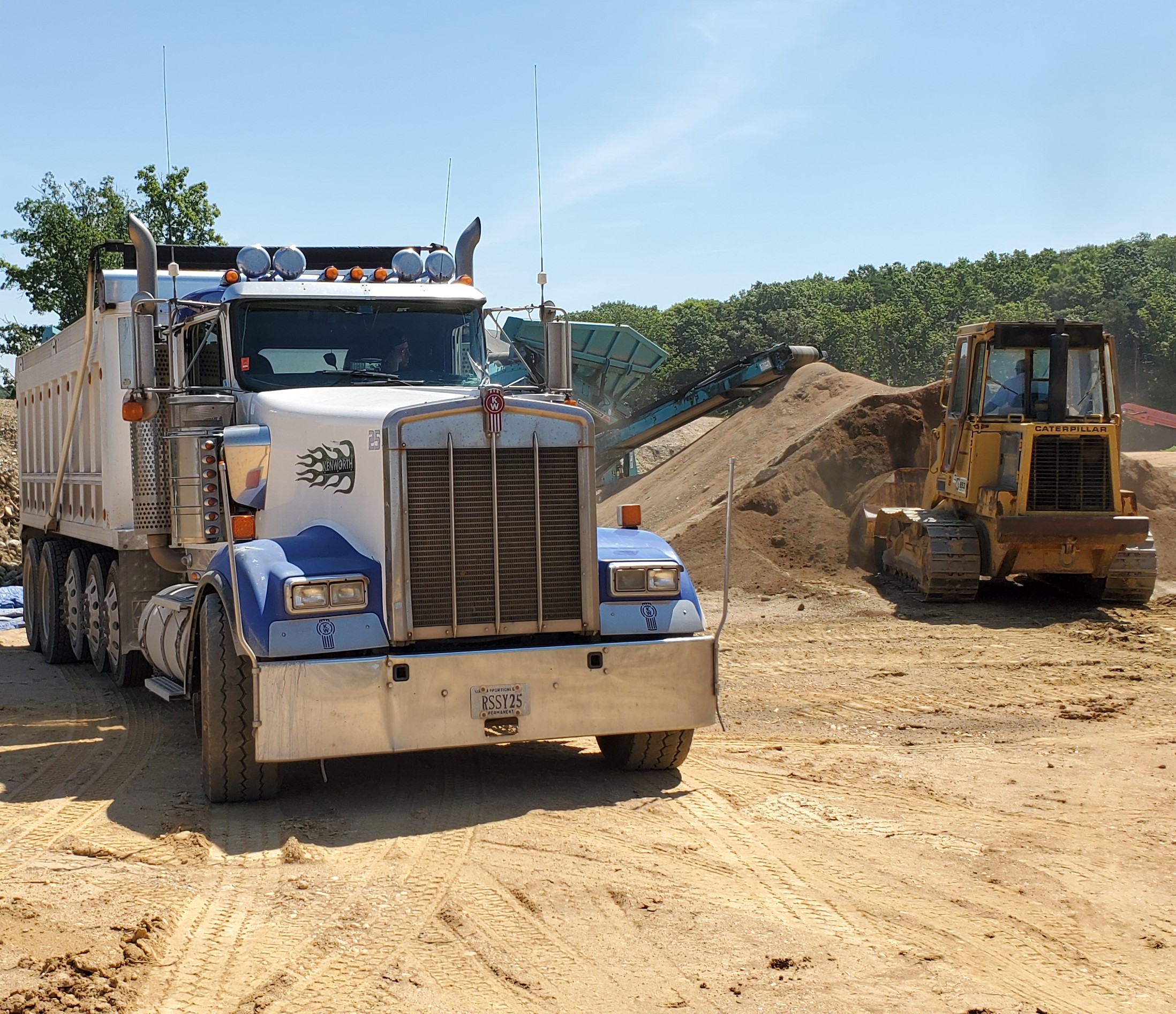 Loading organic topsoil for delivery to Fairfax, Virginia