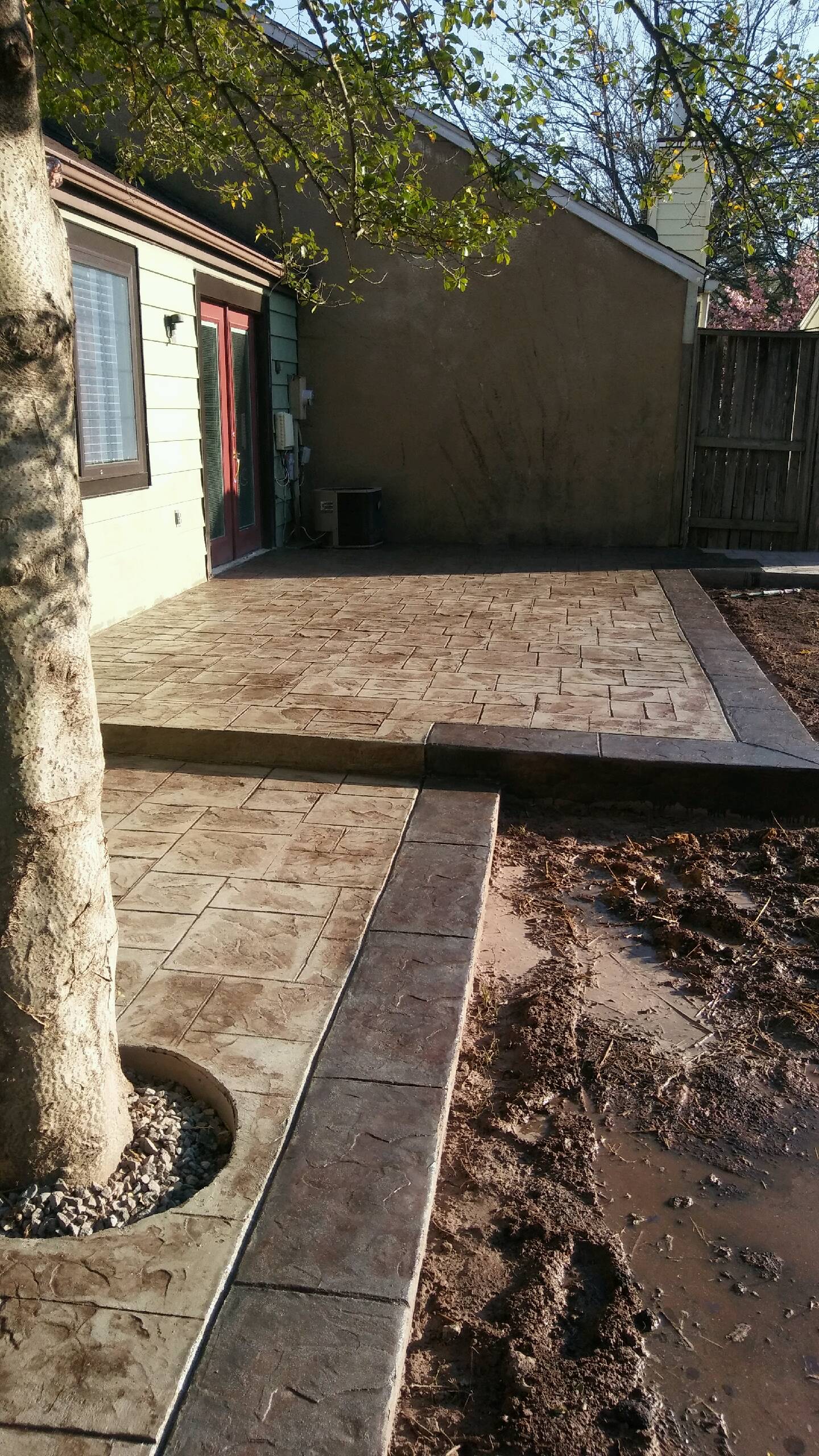 Stamped and stained new concrete patio work