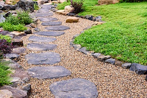 Gravel walkway with stone steps 
