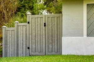 Double Gates of Gray Composite Fence
