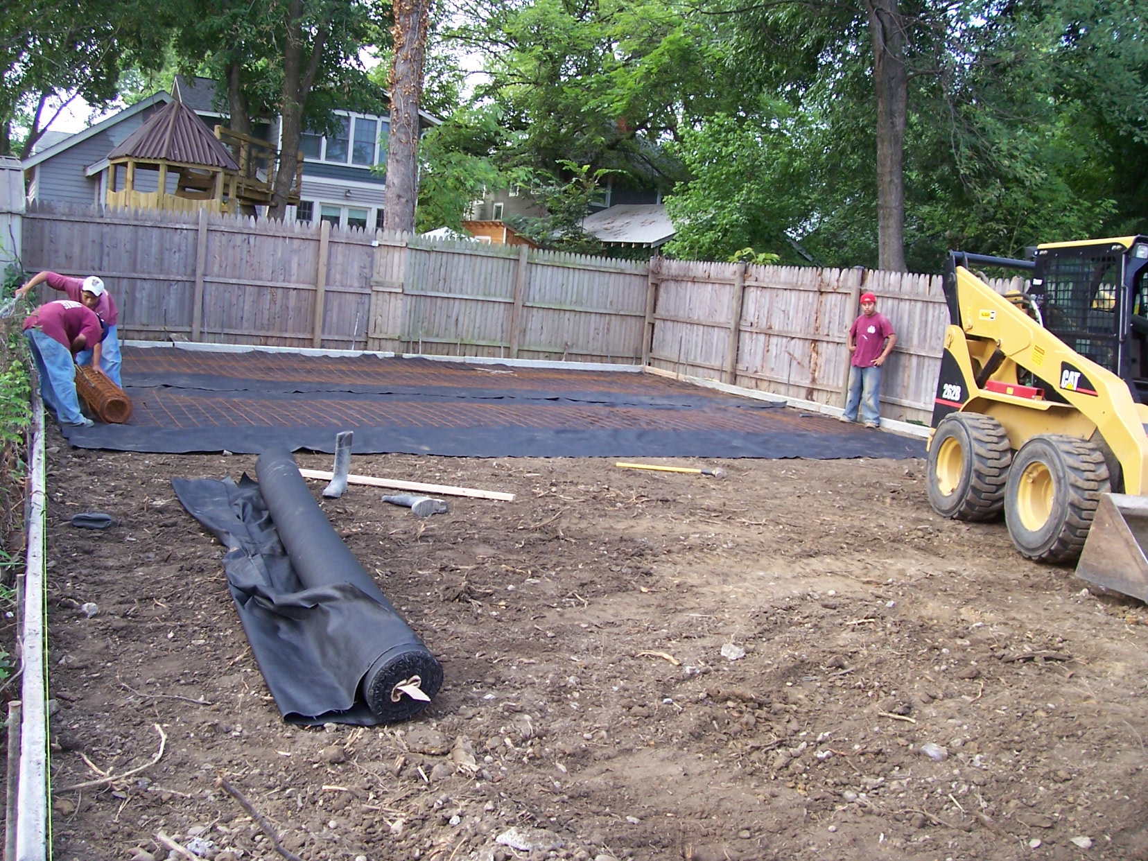 Grading a site for a new concrete driveway