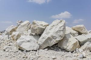 A pile of limestone in a quary. Limestone is the most common way to raise soil pH