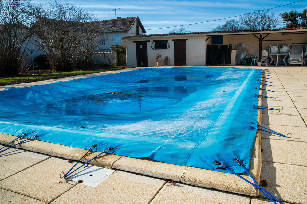 winterized pool with pool cover