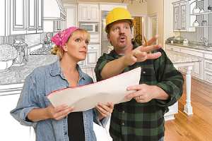 Bathroom remodeling contractor talking with a customer