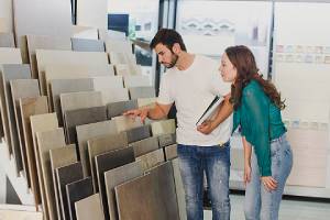 Couple looking for bathroom tiles for their remodeling ideas