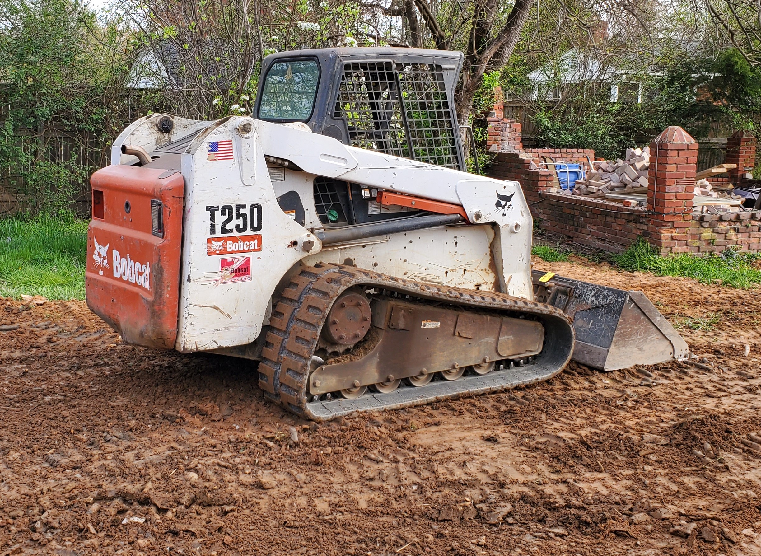 the dirt connections bobcat rental near me can load full size dump trucks