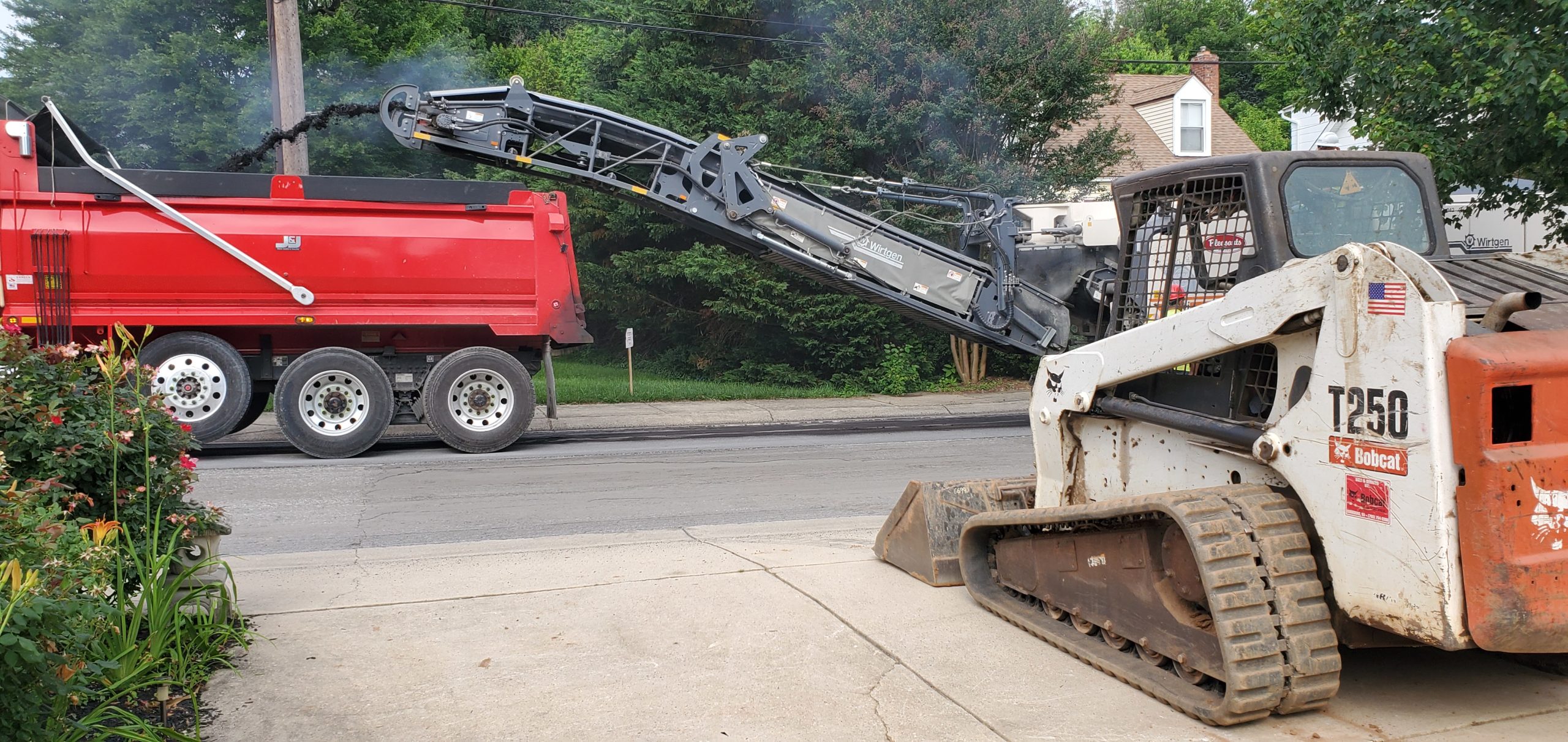 the dirt connections bobcat T-250 track loader near me