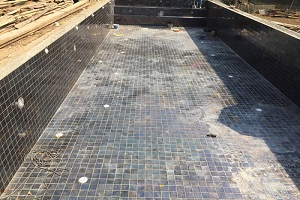 build a pool steps of tiling