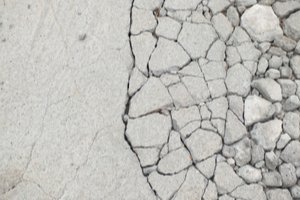 Damaged concrete driveway needing urgent repair