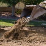 Filling dirt as a part of a pool removal process