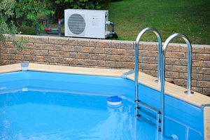 An above ground pool with an air conditioner