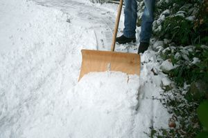Removing snow from the path with the use of a snow plow