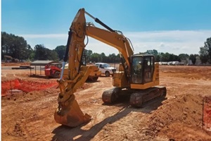 excavator with dozer and truck on grading site in Northern Virginia