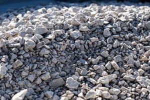 large pile of bulk 57 gravel sits ready to be used on a job site for a DIY home improvement project in Northern Virginia
