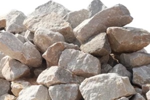 piles of #57 stone crushed stone isolated on white background